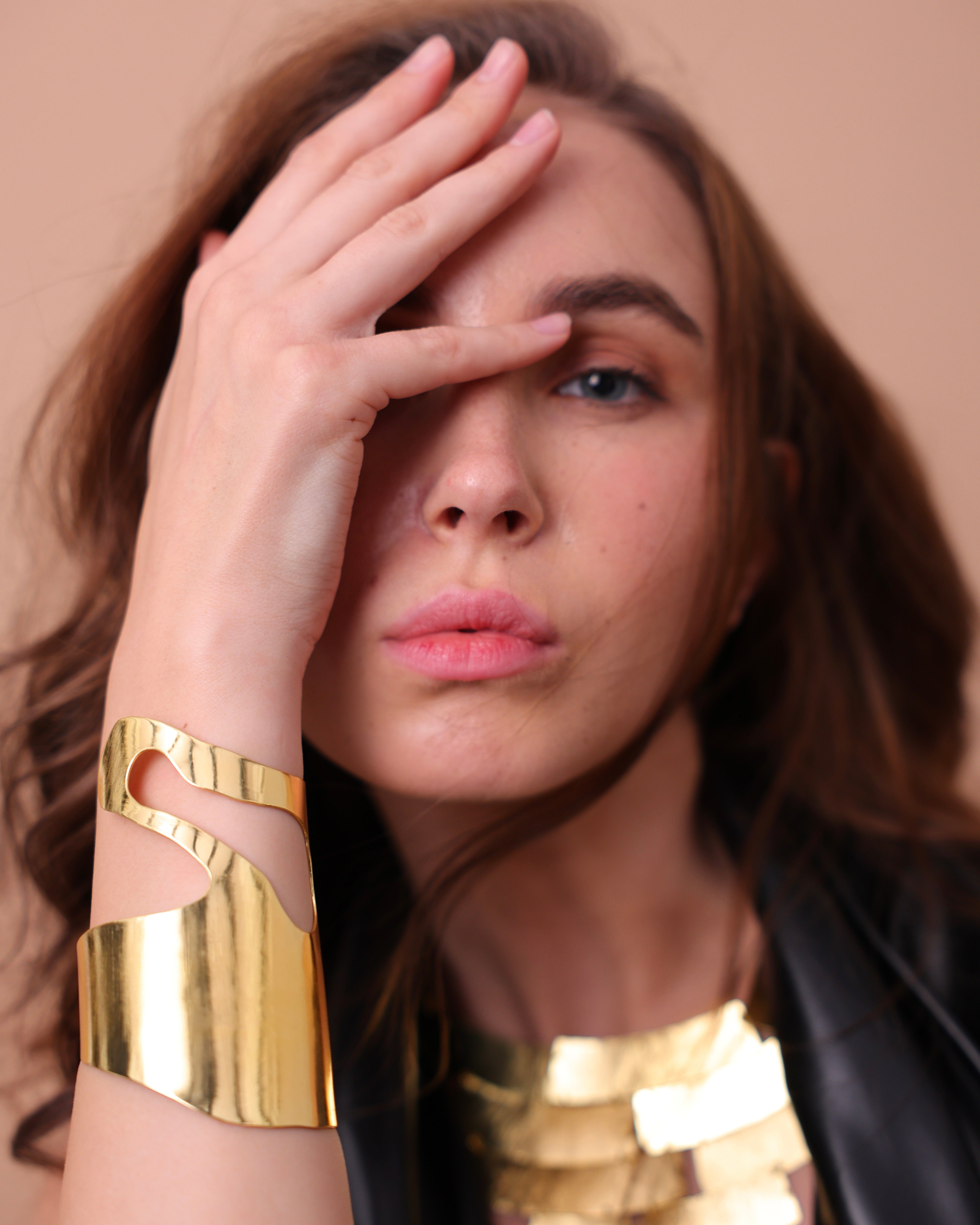 Sculpted Gold Hand Cuff